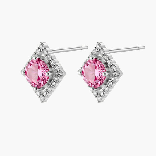 Sterling silver diamond-shaped stud earrings with pink moissanite center stones and crystal halo setting on white background